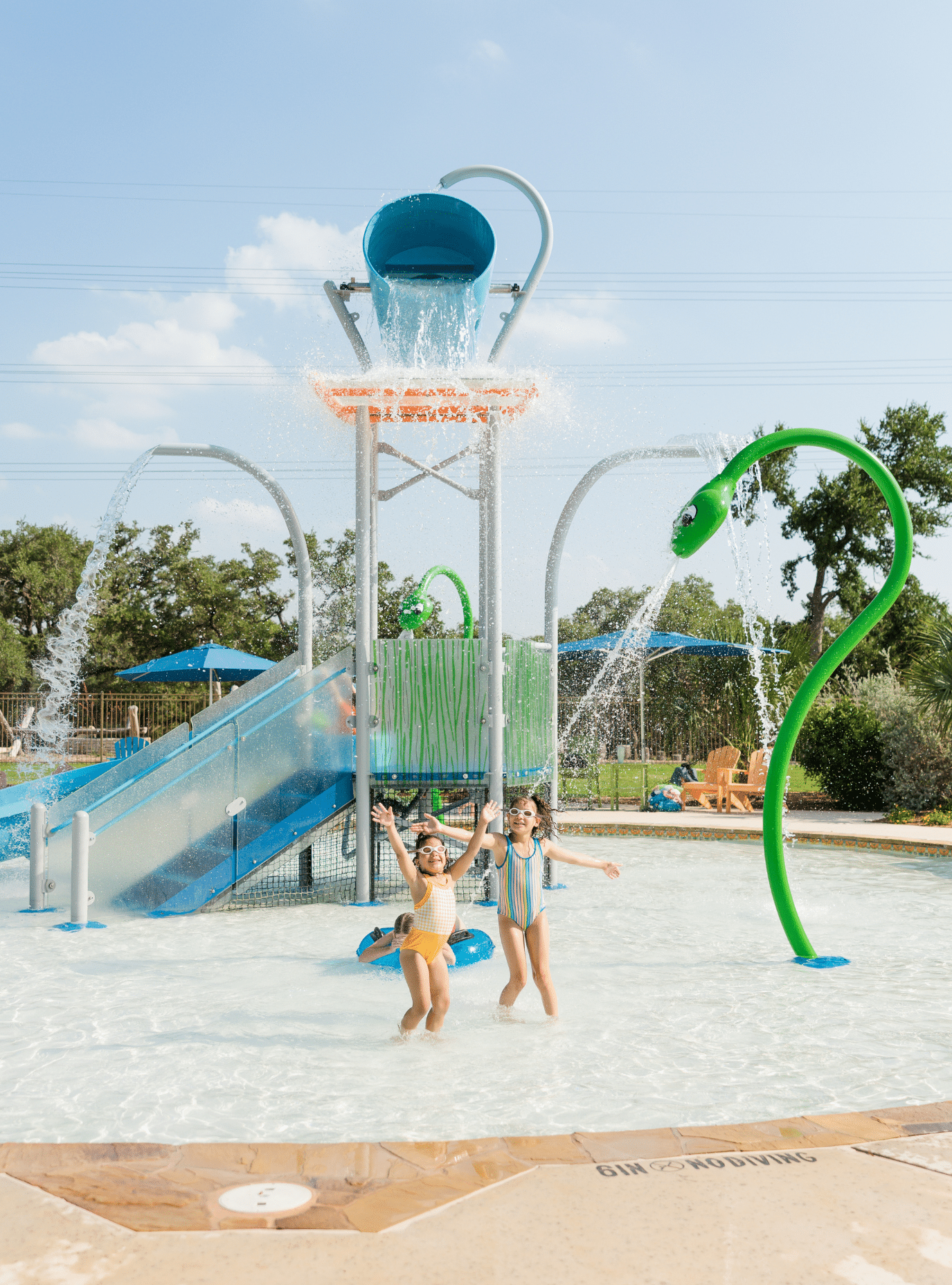 little girls at fiesta pool party 2025